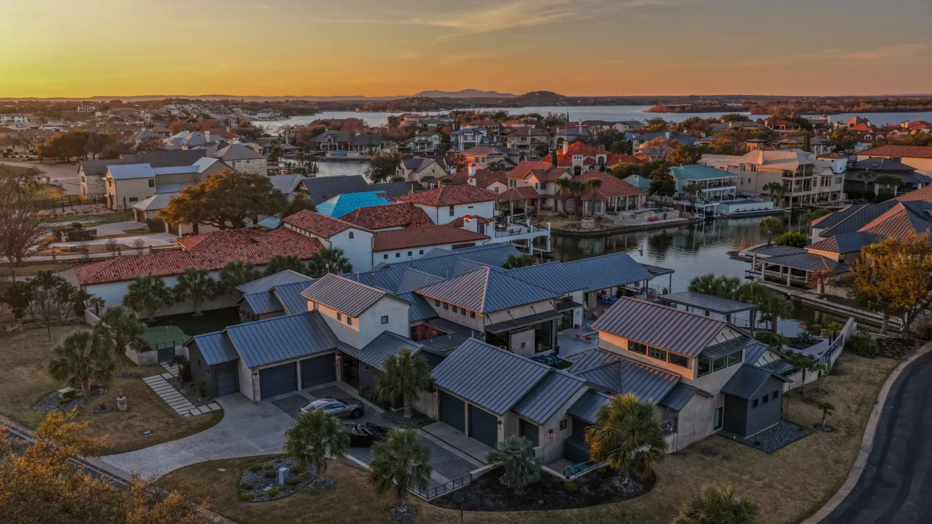 Aerial sunset with Lake LBJ in background